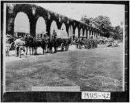 Escort wagons waiting for judges at the horse show of May 17, 1929.
