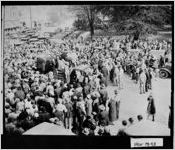 [Photograph of a crowd gathered as merchants give away a bale of cotton, Covington, Newton County, Georgia, 192-]