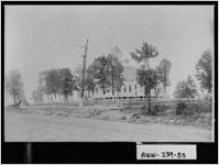 [Photograph of a house in the distance, Newton County, Georgia]