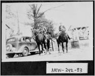 [Photograph of two men on horseback with a Buick car, Newton County, Georgia, ca. 1948]
