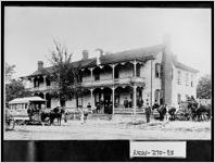 [Photograph of the Flowers Hotel with a trolley on the left, Covington, Newton County, Georgia, ca. 1905]