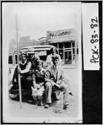 [Photograph of teenagers in front of an automobile in downtown Jasper, Pickens County, Georgia, ca. 1930]