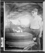 [Photograph of Sharkey Milner in blacksmith shop, Shellman, Randolph County, Georgia, 1976]