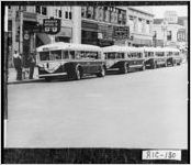 [Photograph of Broad Street with city buses, Augusta, Richmond County, Georgia, 1939 Oct. 10 ]