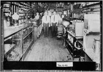 [Photograph of Carlton D. Thomas, Sr. and W. E. Lathum at C. D. Thomas Hardware, Donalsonville, Seminole County, Georgia, 1921]