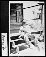 [Photograph of Cullie Coleman with dog, Donalsonville, Seminole County, Georgia, 1952]