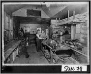 [Photograph of interior of the W. L. Howell Tin Shop, Americus, Sumter County, Georgia, ca. 1920]