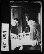 [Photograph of Barney Burson and Audie Murphy playing checkers, United States, between 1939 amd 1945]