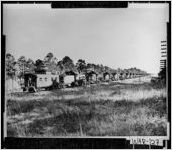 [Photograph of Atlantic Coastline engines going to scrap yards, Waycross, Ware County, Georgia, ca. 1950]