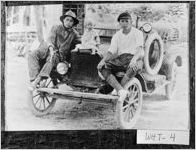 [Photograph of two boys and a child sitting on the front of a 1916 car, White County, Georgia, 1917]