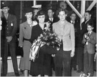 [Photograph of Pete Wilborn, Mrs. Henry W. Grady III, Mrs. Eugene Black, Mrs. Fredrica Ward, Ralph McGill, and Michael Black at the launching of the Liberty ship Henry W. Grady, J.A. Jones Construction Company shipyard, Brunswick, Georgia, 1943 Oct. 22?]