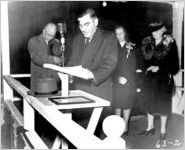 [Photograph of the Reverend John Sharp giving an invocation at a Liberty ship launching, J.A. Jones Construction Company shipyard, Brunswick, Georgia, 1943/1945?]