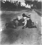 [Photograph of four Richmond County, Ga., children (boys) playing in the middle of a dirt road]