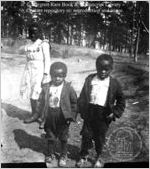 [Photograph of three African American children in or near Richmond County, Georgia, late 19th century]