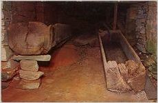 Hollowed logs used as brine vats for curing meat in the kitchen at Jarrett Manor, Historic House Museum