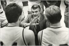 Coach Jack Berkshire with basketball players