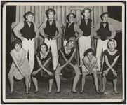 Photograph of "Charleston" scene cast members in costume, in dancing positions, for the pageant that was held during the Worth County Centennial Celebration in Sylvester, Worth County, Georgia, 1953 October