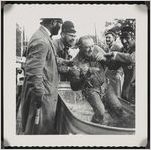 Photograph of Walter Bill Sams and Theron Clements during the "Crime and Punishment" part of the Worth County Centennial Celebration in Sylvester, Worth County, Georgia, 1953 October