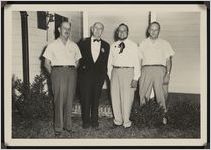 Photograph of Sheriff Davis Hudson, Senator Richard B. Russell, William "Bill" Sams, and Cody Lairo on Agriculture Day during the Worth County Centennial Celebration in Sylvester, Worth County, Georgia, 1953 October