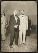 Photograph of Senator Richard B. Russell and Harmon Jeffords in costume on Agriculture Day during the Worth County Centennial Celebration in Sylvester, Worth County, Georgia, 1953 October