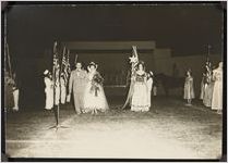 Photograph of Miss Centennial Betty Jean Carter being escorted by Leon Houston Sr. at the Sylvester High School stadium during the Worth County Centennial Celebration in Sylvester, Worth County, Georgia , 1953 October