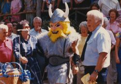 Photograph of Drew the Viking at the Grand March with Gloria Shatto and Dan Biggers, Mount Berry, Georgia, 1986 October