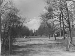 Photograph of a distant view of the front of the Mount Berry Chapel, taken from a dirt road, Mount Berry, Georgia, 19XX