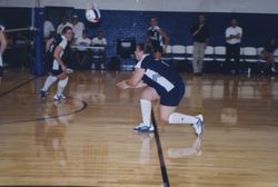 Photograph of volleyball players during a game in the Roy Richards Memorial Gymnasium, Mount Berry, Georgia, 2003