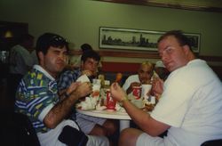 Photograph of Olympic Youth Camp members sitting and eating during the 1996 Summer Olympics, Atlanta, Georgia, 1996 July