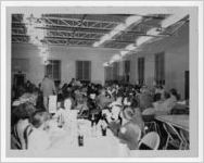 Photograph of people eating at a buffet, Manchester, Georgia, 1953