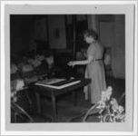 Photograph of Mrs. Caldwell standing before a group, Manchester, Georgia, 1953