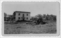 Photograph of a partially demolished building, Manchester, Georgia, 1953
