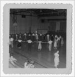 Photograph of a sqaure dance in the high school gym, Manchester, Georgia, 1953