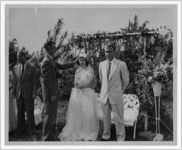Photograph of Franklin Pike and Patty Chalmers being crowned May Day king and queen by E. C. Mitcham, Manchester, Georgia, 1953