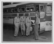 Photograph of three soldiers boarding a bus, Manchester, Georgia, 1953