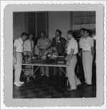 Photograph of the Kiwanis club presenting vision testing equipment to the local school, Manchester, Georgia, 1953