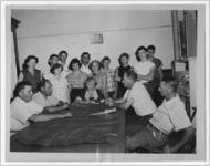 Photograph of a group of teenagers meeting with city council, Manchester, Georgia, 1953
