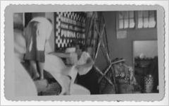 Photographof women putting together a farm display, Manchester, Georgia, 1953