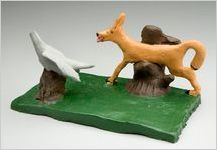 Dog chases broken bird