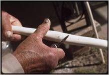 Woodwork: Clyde Paul. Clyde Paul carving walking stick.