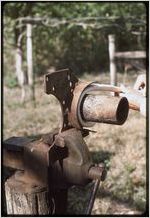 Woodwork: Clyde Paul. Clyde Paul using wood press