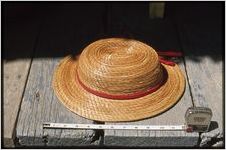 Rural crafts: Johnnie Ree Jackson. Pine straw hat with ruler