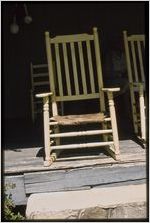 Rural crafts: Johnnie Ree Jackson. Wooden chair with animal hide seat