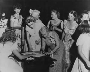 Women Signing Guest Book