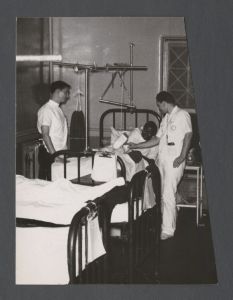 School of Medicine - Doctors examine patient's leg