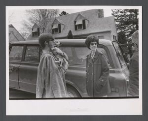Students, groups, 1970s - Emory student with his family, holding a dog
