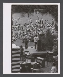 Students, groups, 1970s - Southern rock band Hydra performs for students on soccer field