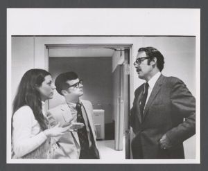 Students, groups, 1970s - Man talking to two students