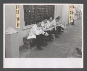 School of Medicine - Students relaxing on a bench