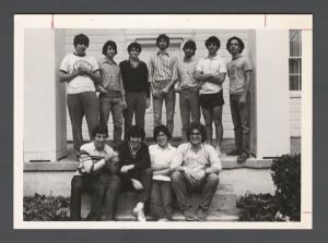 Fraternity Candidates - Group portrait of students outside fraternity house